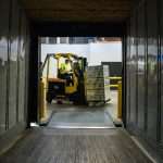 cargo container and forklift