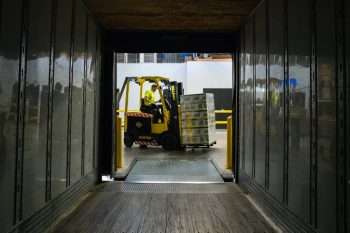 cargo container and forklift